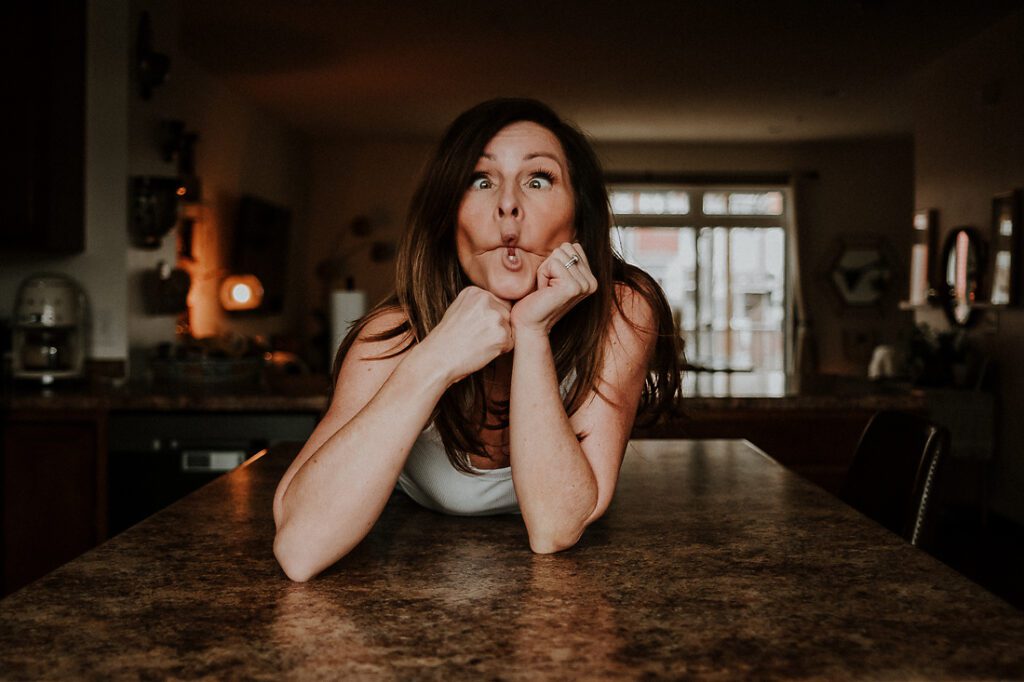Self-love portrait capturing authentic joy and vulnerability