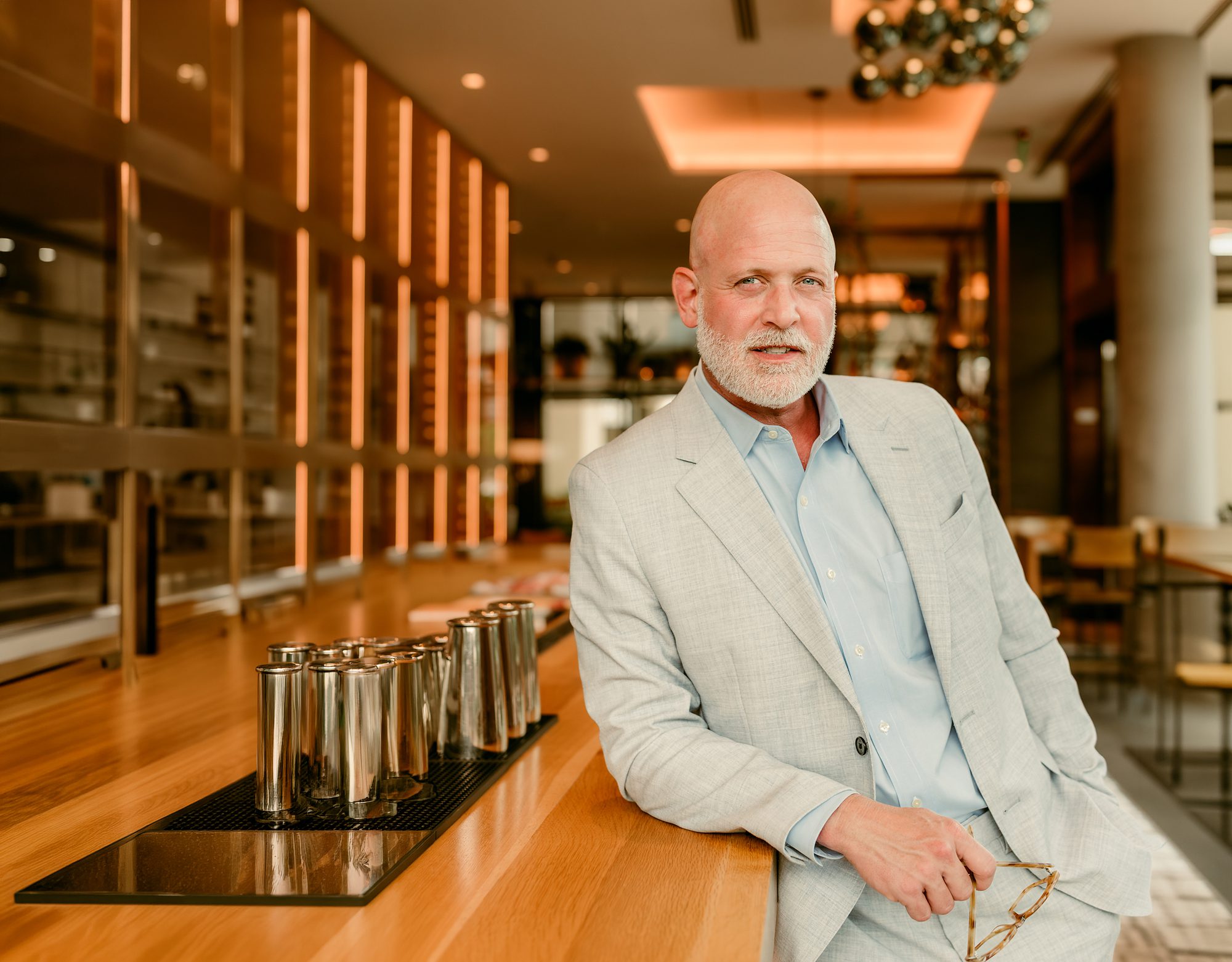 Man in an upscale lounge for dating photos for men in Dallas.